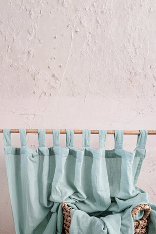 Mint tabs on rod with wicker basket. Handwoven 2-layer muslin cotton curtain, Denizli, OEKO-TEX. Vivamaison.