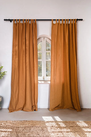 Camel tab top panels, arched window, rug. Handwoven 2-layer muslin cotton curtain, Denizli, OEKO-TEX. Vivamaison.
