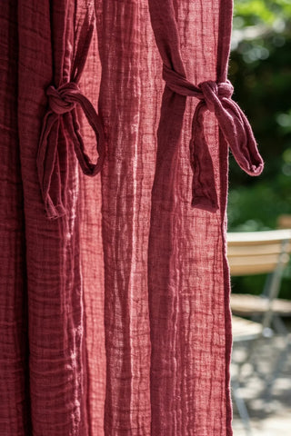 Close-up tieback bow knots on gauze fabric. Handwoven 2-layer muslin cotton curtain, Denizli, OEKO-TEX. Vivamaison.