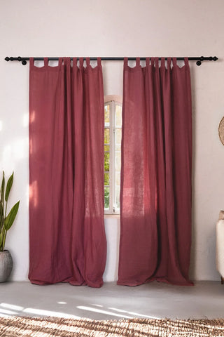 Two wine tab top panels framing arched window. Handwoven 2-layer muslin cotton curtain, Denizli, OEKO-TEX. Vivamaison.