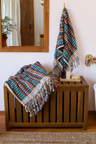 Rainbow handwoven Turkish cotton pom pom woven towel set folded. Tasseled fringe Denizli, OEKO-TEX. Vivamaison.