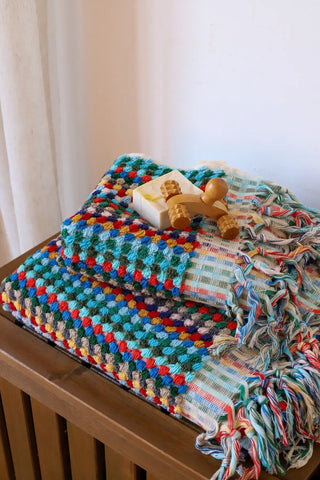 Rainbow handwoven Turkish cotton pom pom woven towel set lifestyle. Tasseled fringe Denizli, OEKO-TEX. Vivamaison.