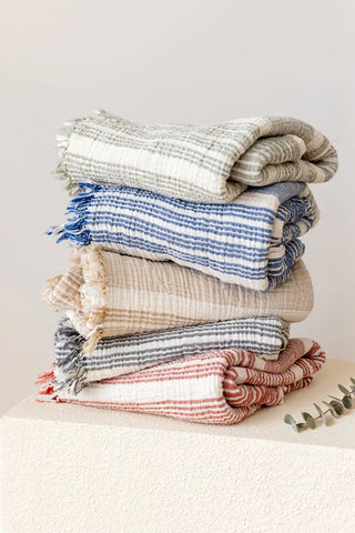 Striped peshtemal towel color collection lifestyle display. Handwoven Turkish cotton Denizli, OEKO-TEX. Vivamaison.