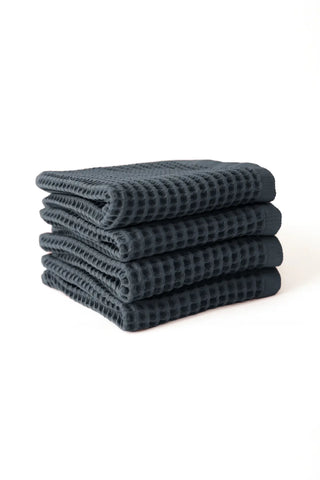 Anthracite handwoven Turkish cotton waffle weave towel set of 4 hand towels stacked. Denizli, OEKO-TEX. Vivamaison.
